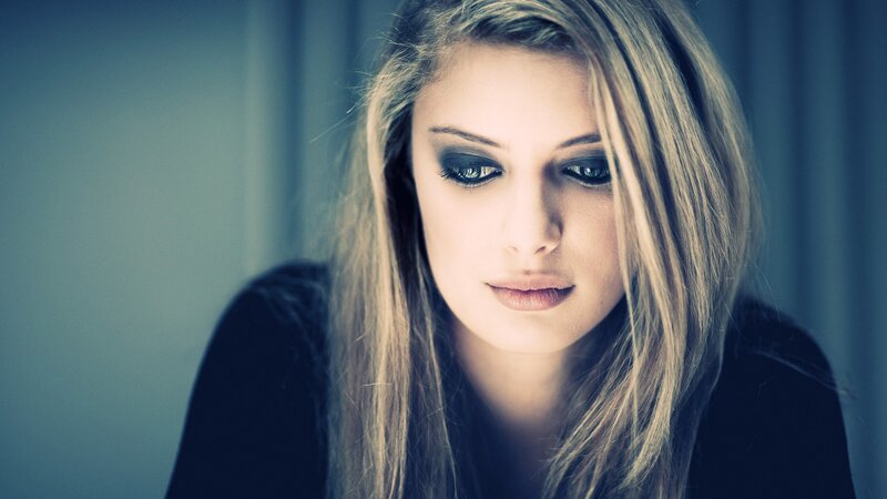 woman with dark eye makeup