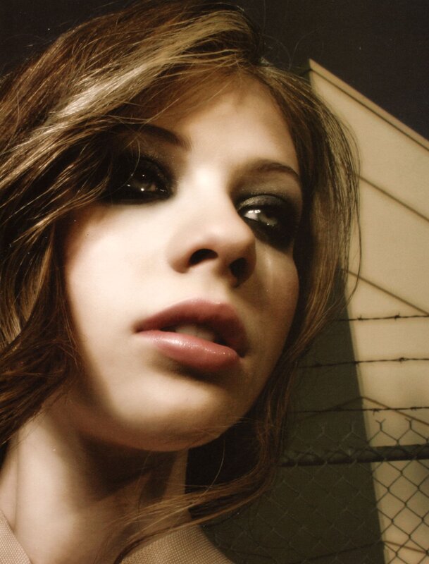 woman with dark eye makeup