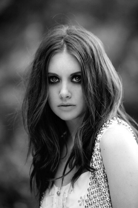 woman with dark eye makeup
