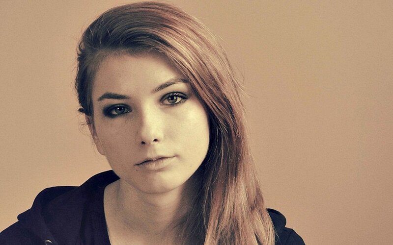 woman with dark eye makeup