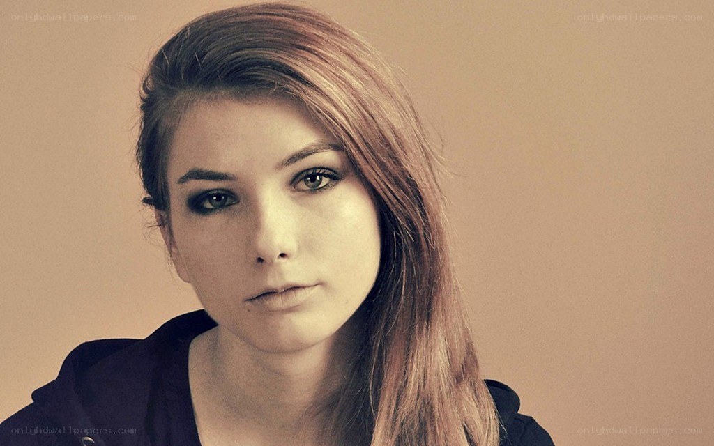 woman with dark eye makeup