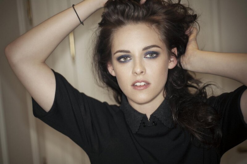 woman with dark eye makeup