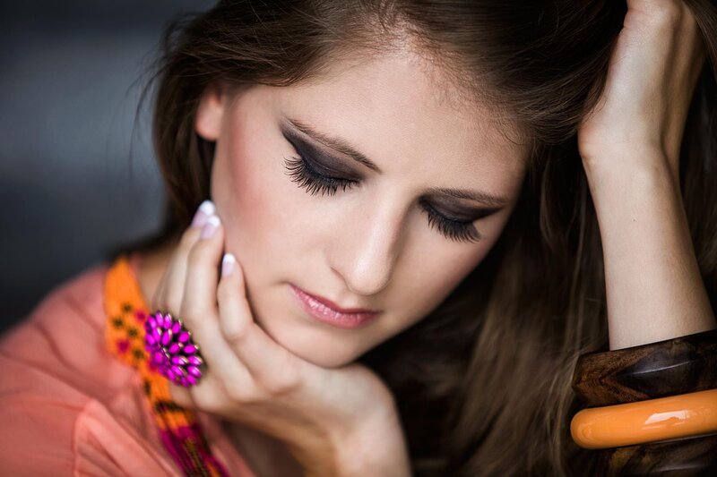 woman with dark eye makeup
