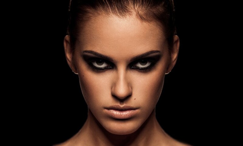 Woman with Dark Eye Makeup — Black, Dramatic
