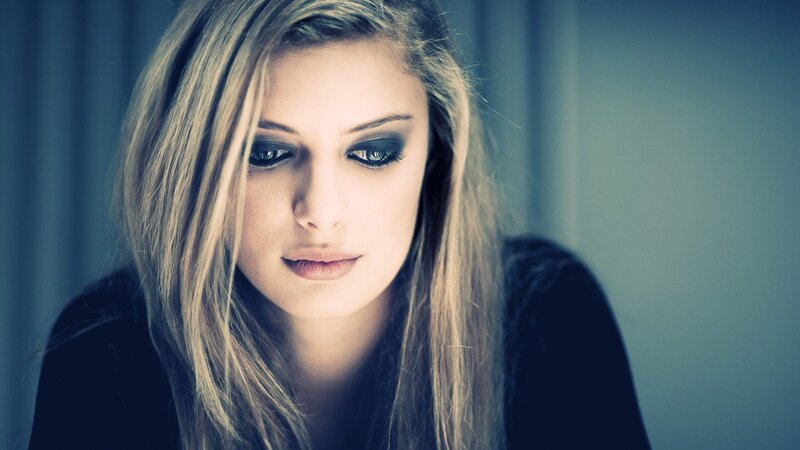 Woman with Dark Eye Makeup — Blue, Dramatic