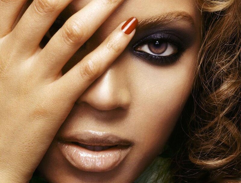 Woman with Dark Eye Makeup — Brown, Dramatic