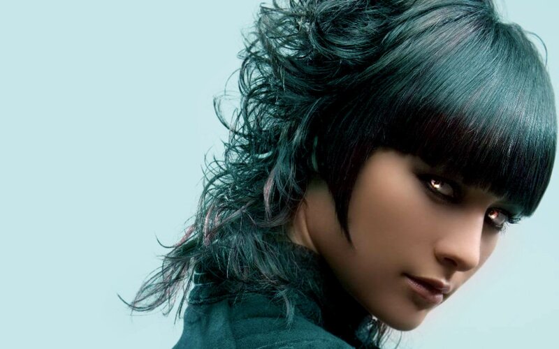 woman with dark green hair