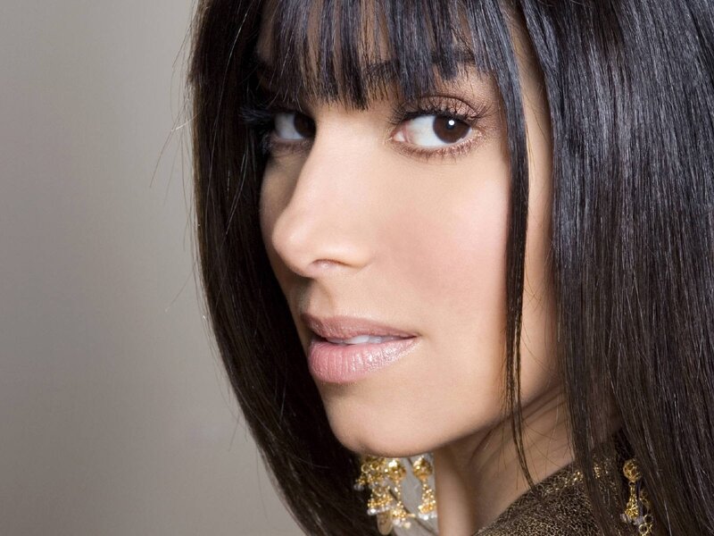 woman with dark hair and bangs