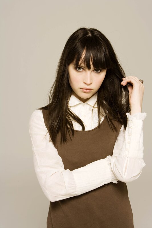 woman with dark hair and bangs