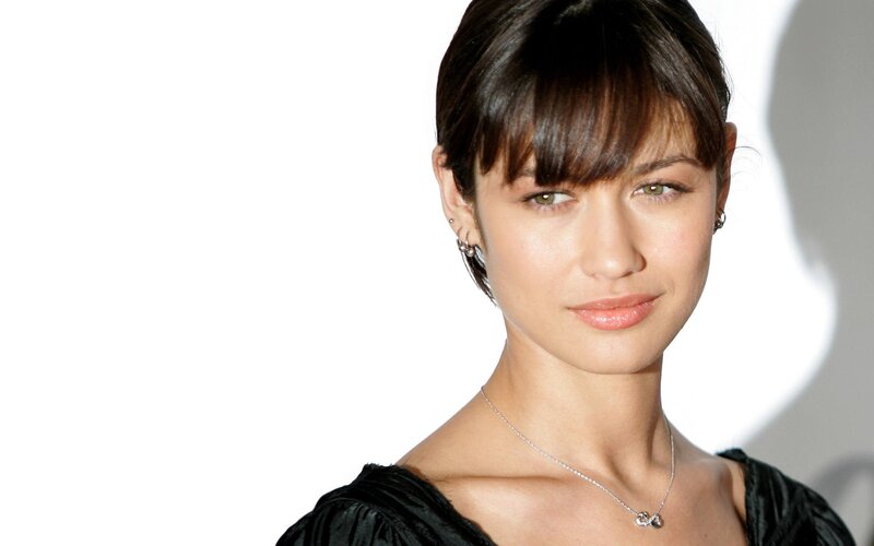 woman with dark hair and bangs