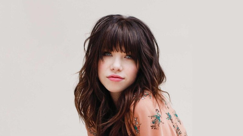 woman with dark hair and bangs