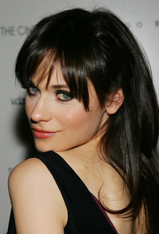 woman with dark hair and bangs