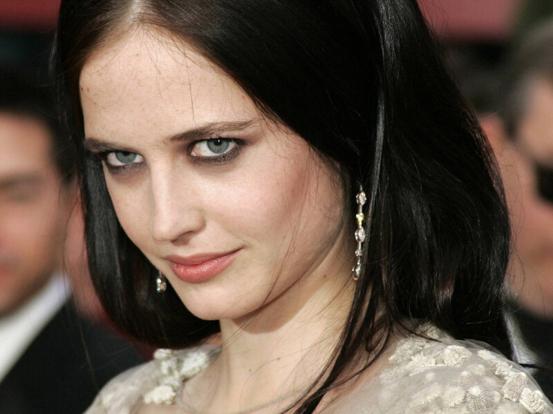 woman with dark hair and blue eyes