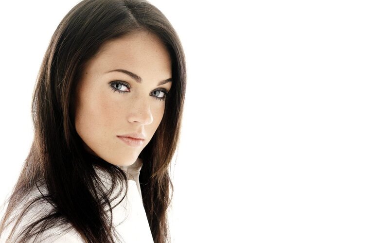 woman with dark hair and blue eyes