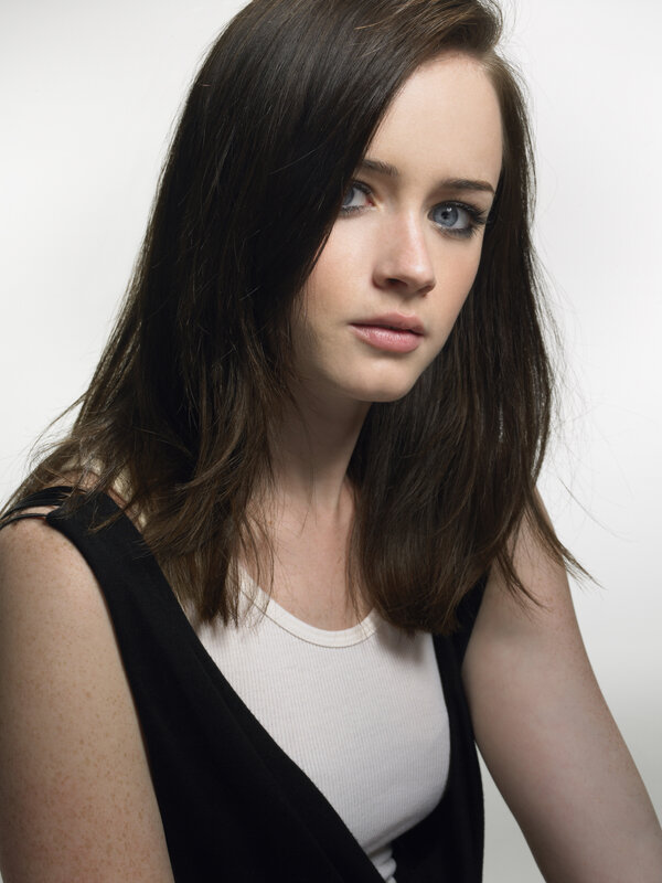 woman with dark hair and blue eyes
