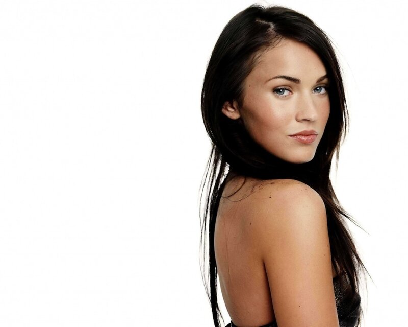 woman with dark hair and blue eyes