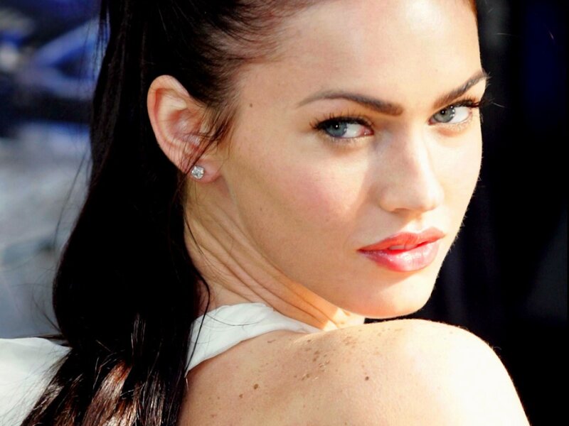 woman with dark hair and blue eyes