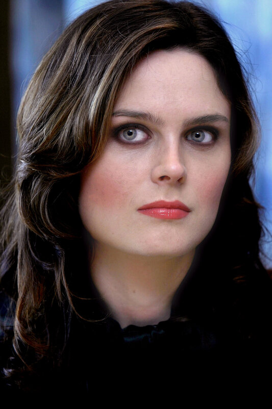 woman with dark hair and blue eyes
