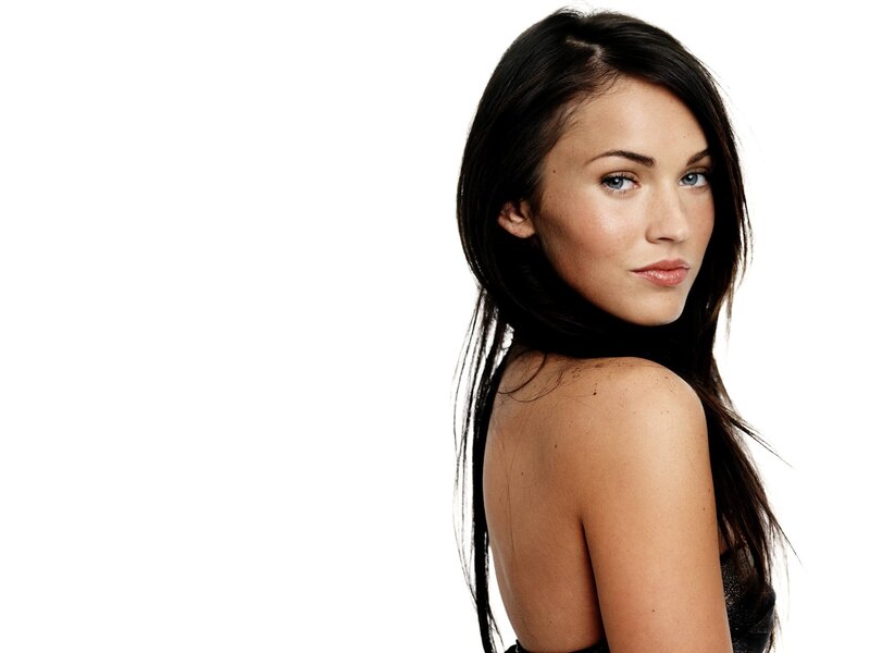 woman with dark hair and blue eyes