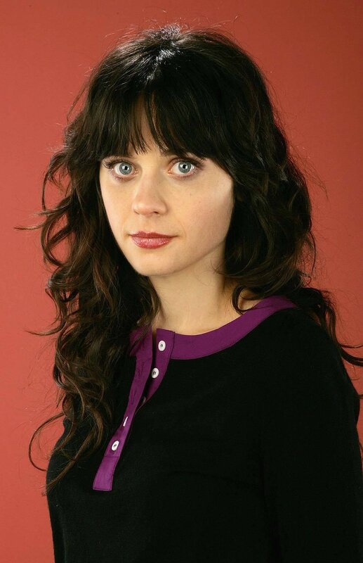 woman with dark hair and blue eyes