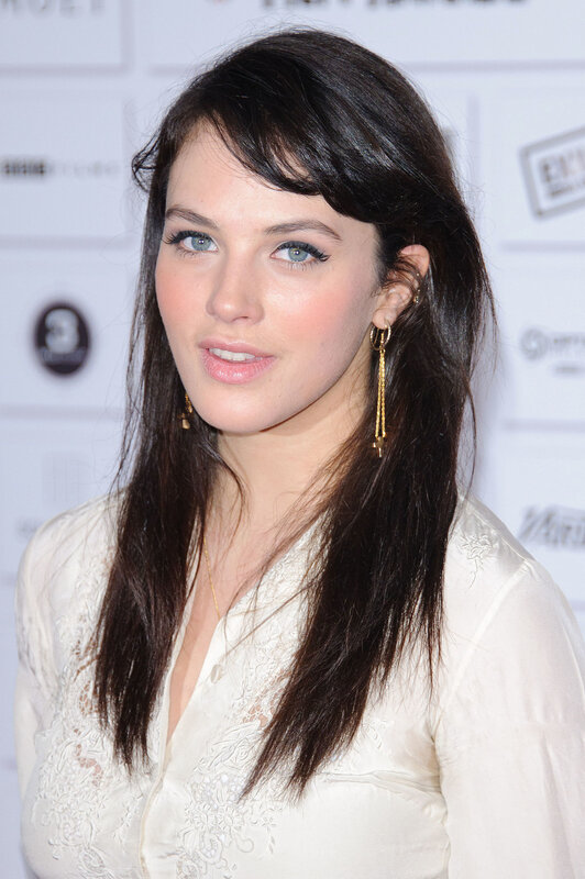woman with dark hair and blue eyes