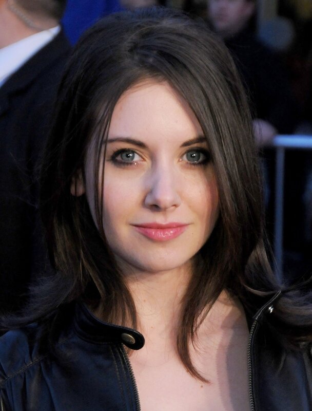 woman with dark hair and blue eyes