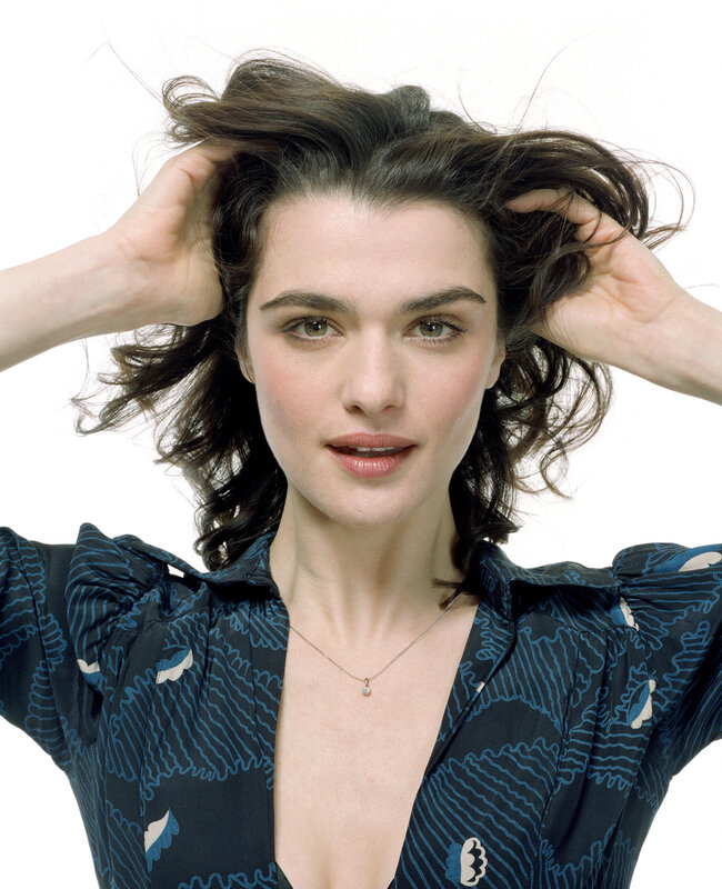woman with dark hair and blue shirt