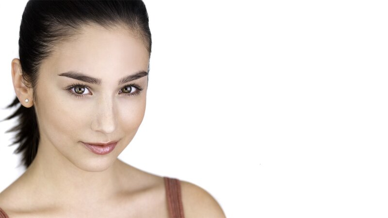 woman with dark hair and brown eyes