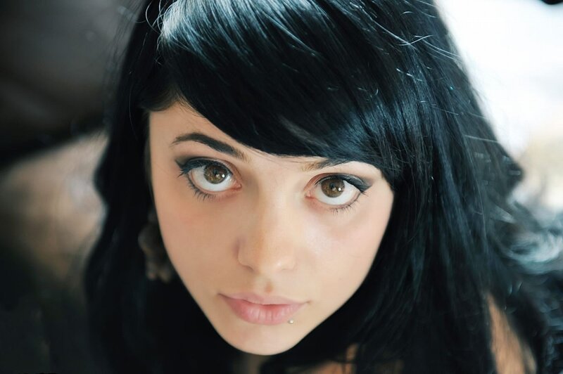 woman with dark hair and brown eyes