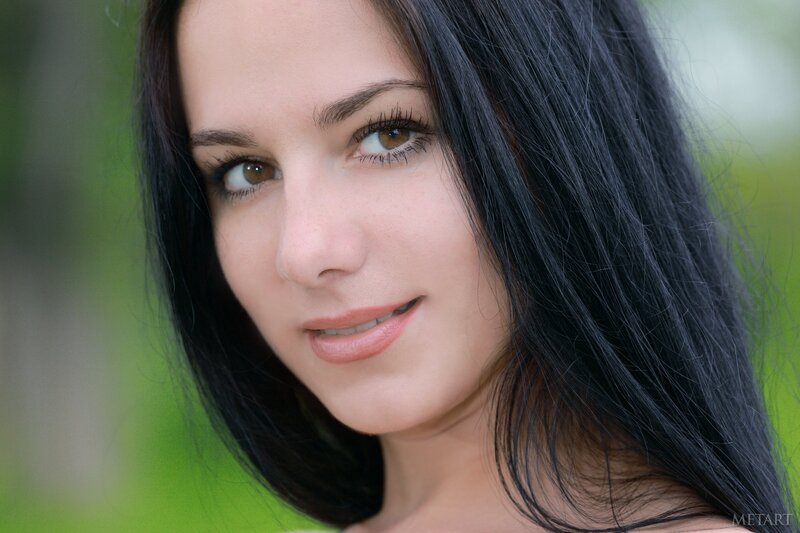woman with dark hair and brown eyes