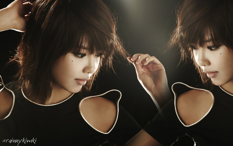 woman with dark hair and cutout top