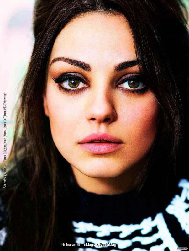 woman with dark hair and green eyes