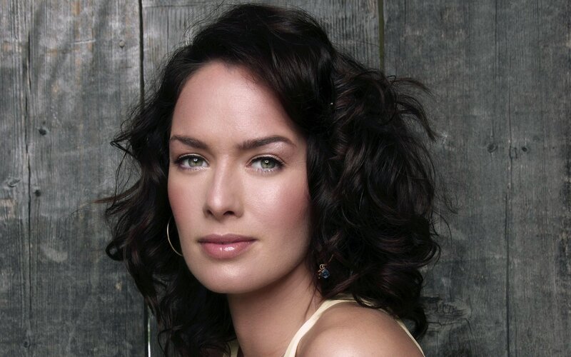 woman with dark hair and green eyes