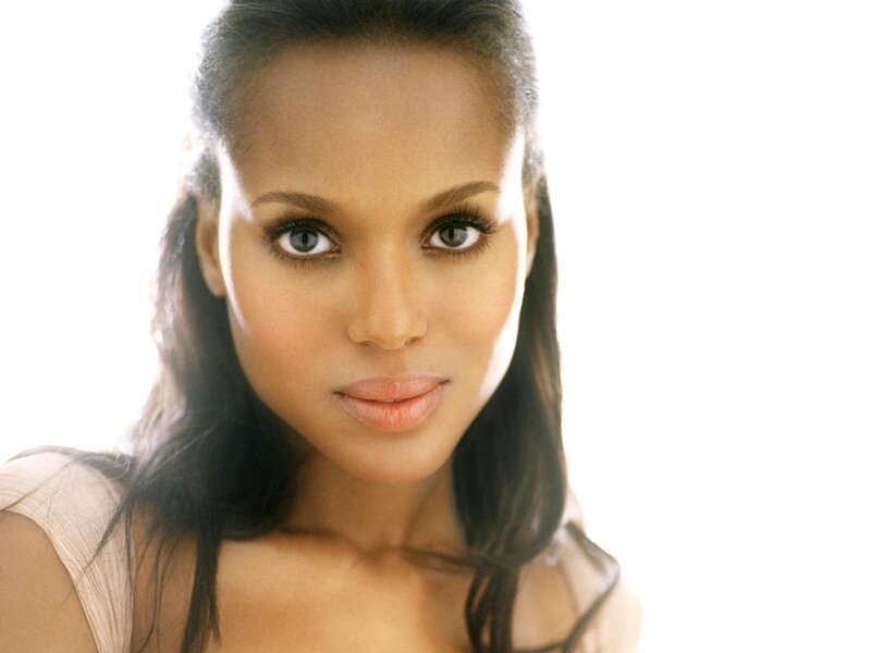 woman with dark hair and green eyes