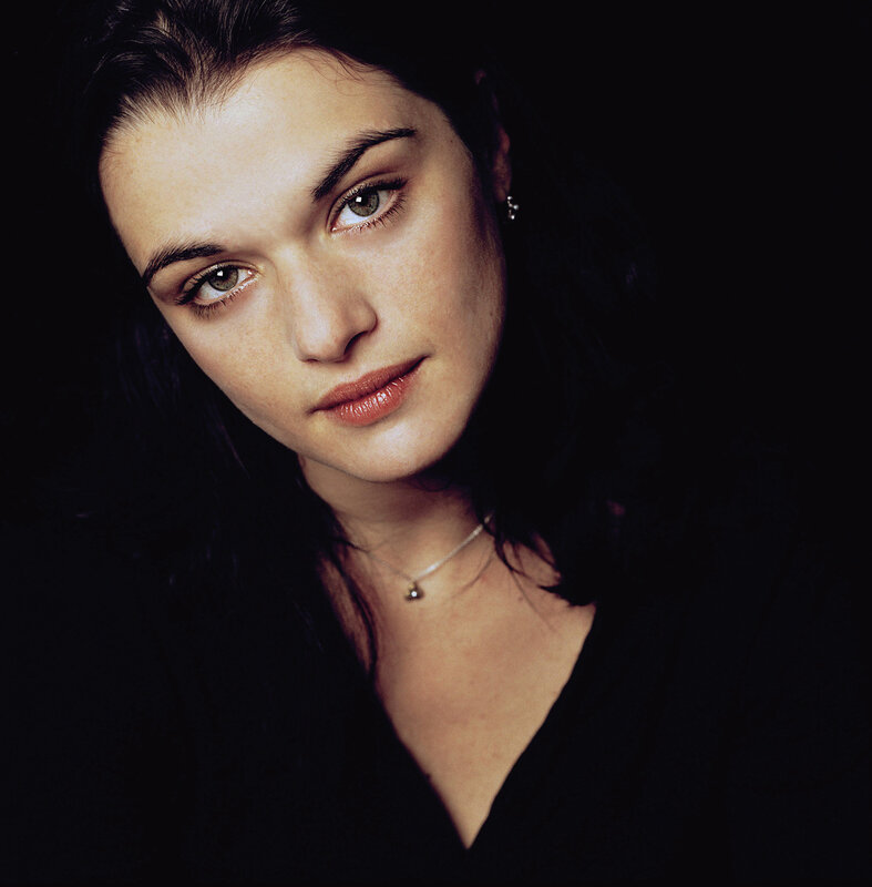 woman with dark hair and green eyes