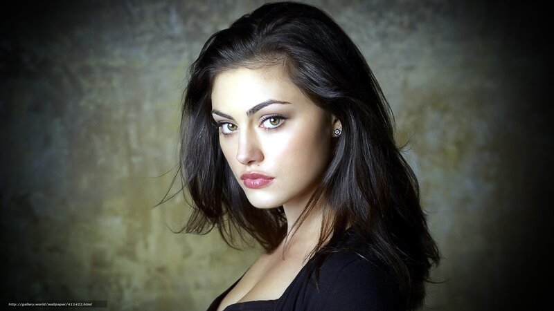 woman with dark hair and green eyes
