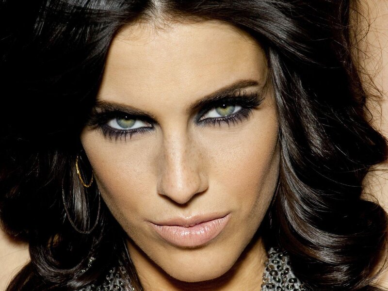 woman with dark hair and green eyes