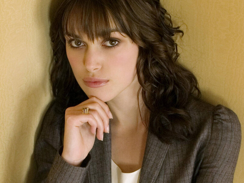woman with dark hair and jacket