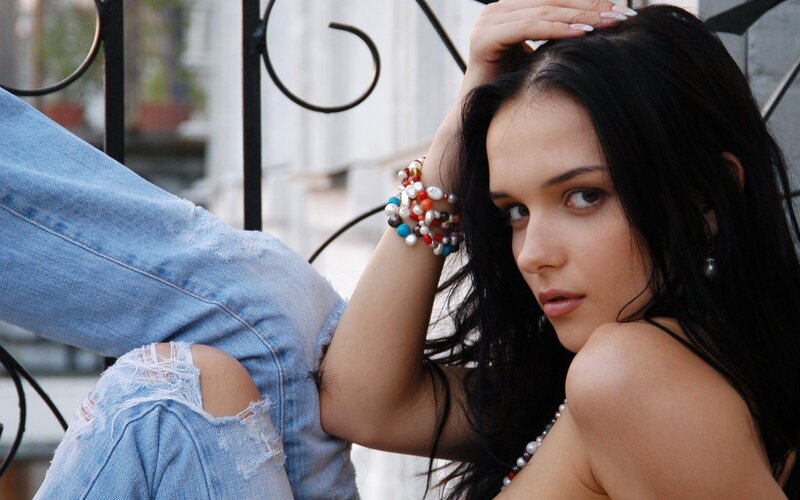 woman with dark hair and jeans