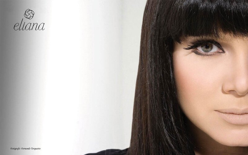 woman with dark hair and makeup