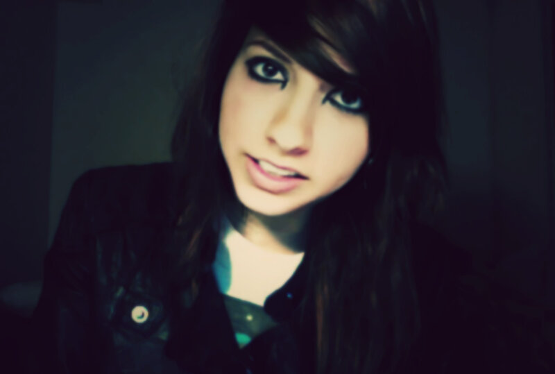 woman with dark hair and makeup