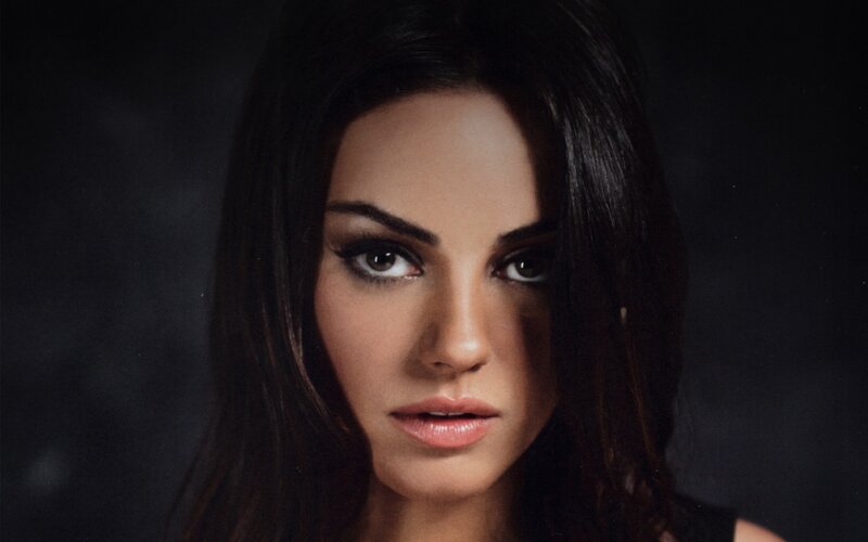woman with dark hair and makeup
