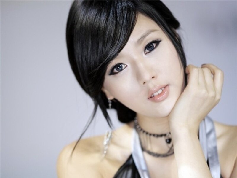 woman with dark hair and makeup
