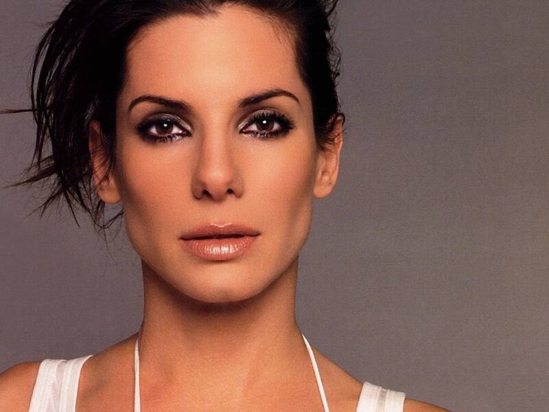 woman with dark hair and makeup