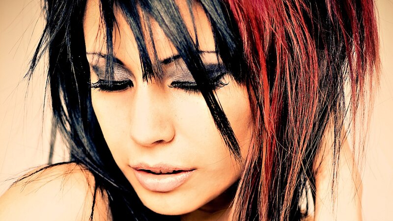 woman with dark hair and makeup