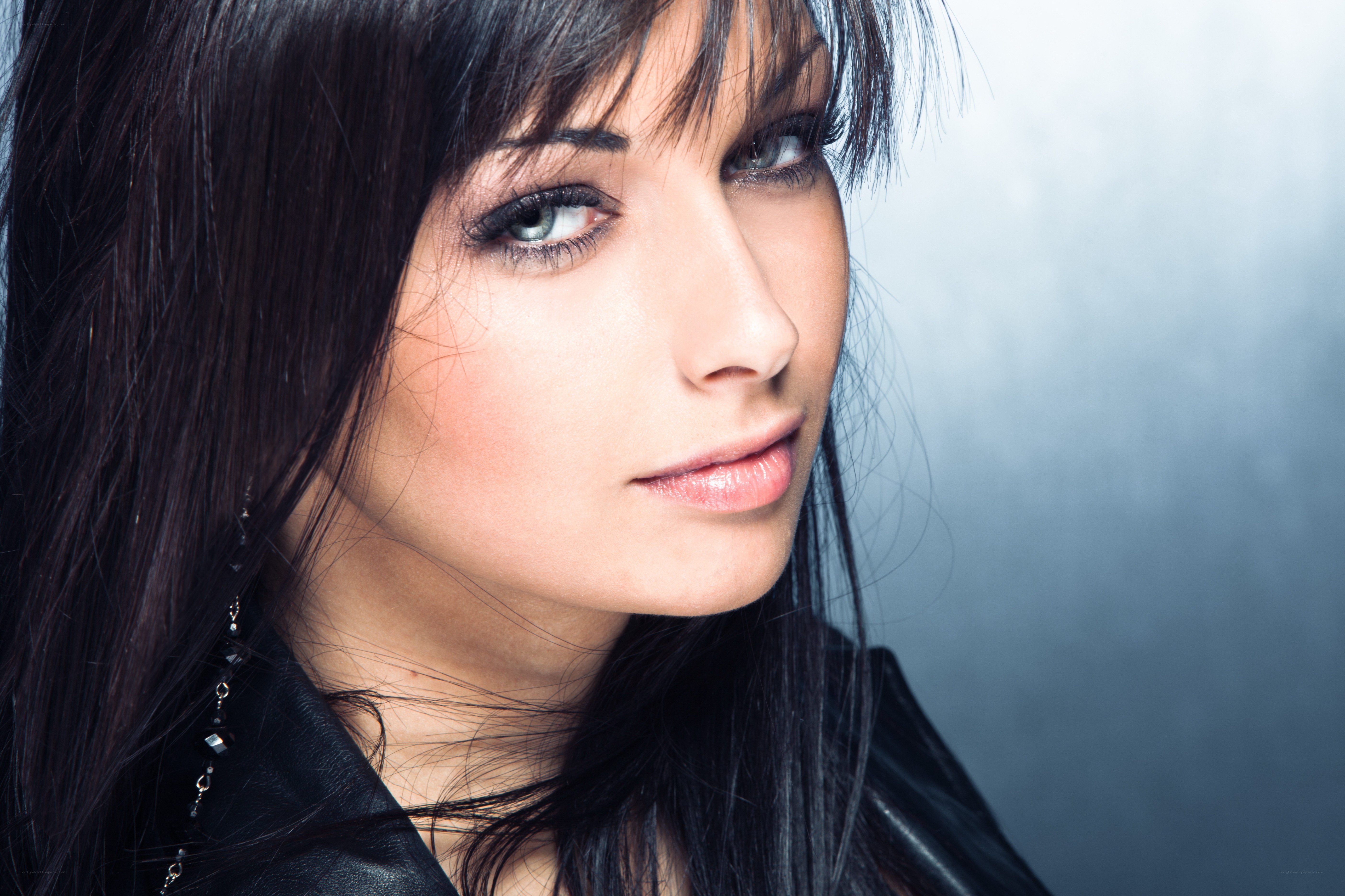 woman with dark hair and makeup