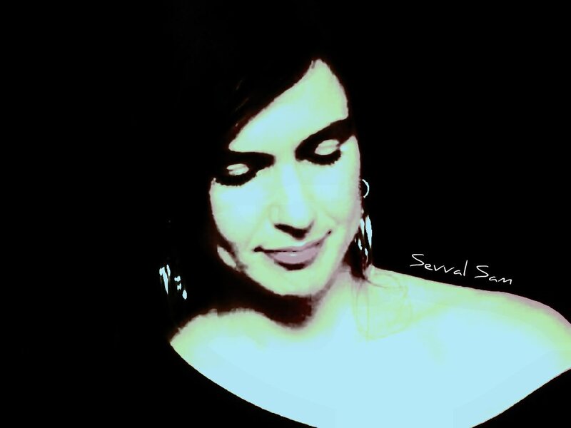 woman with dark hair and makeup
