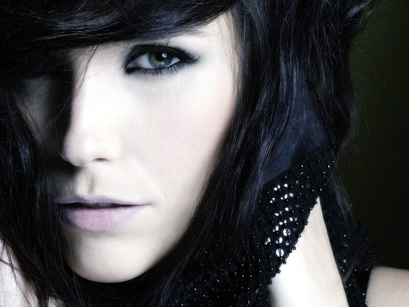 woman with dark hair and makeup