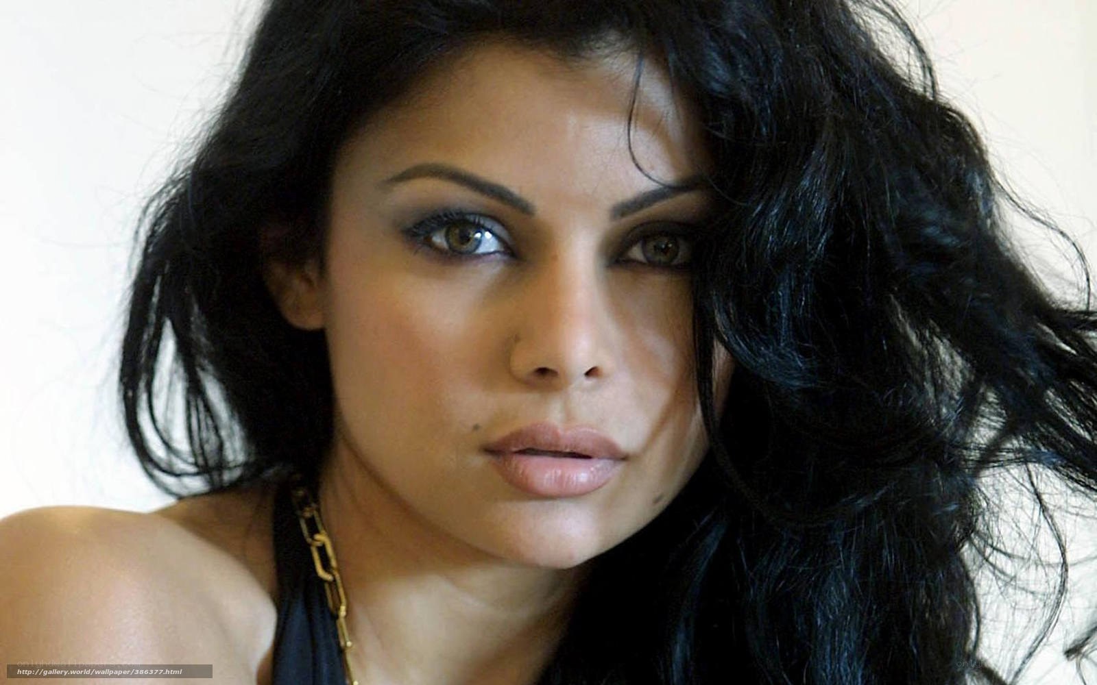 woman with dark hair and makeup