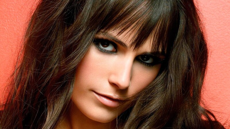 woman with dark hair and makeup